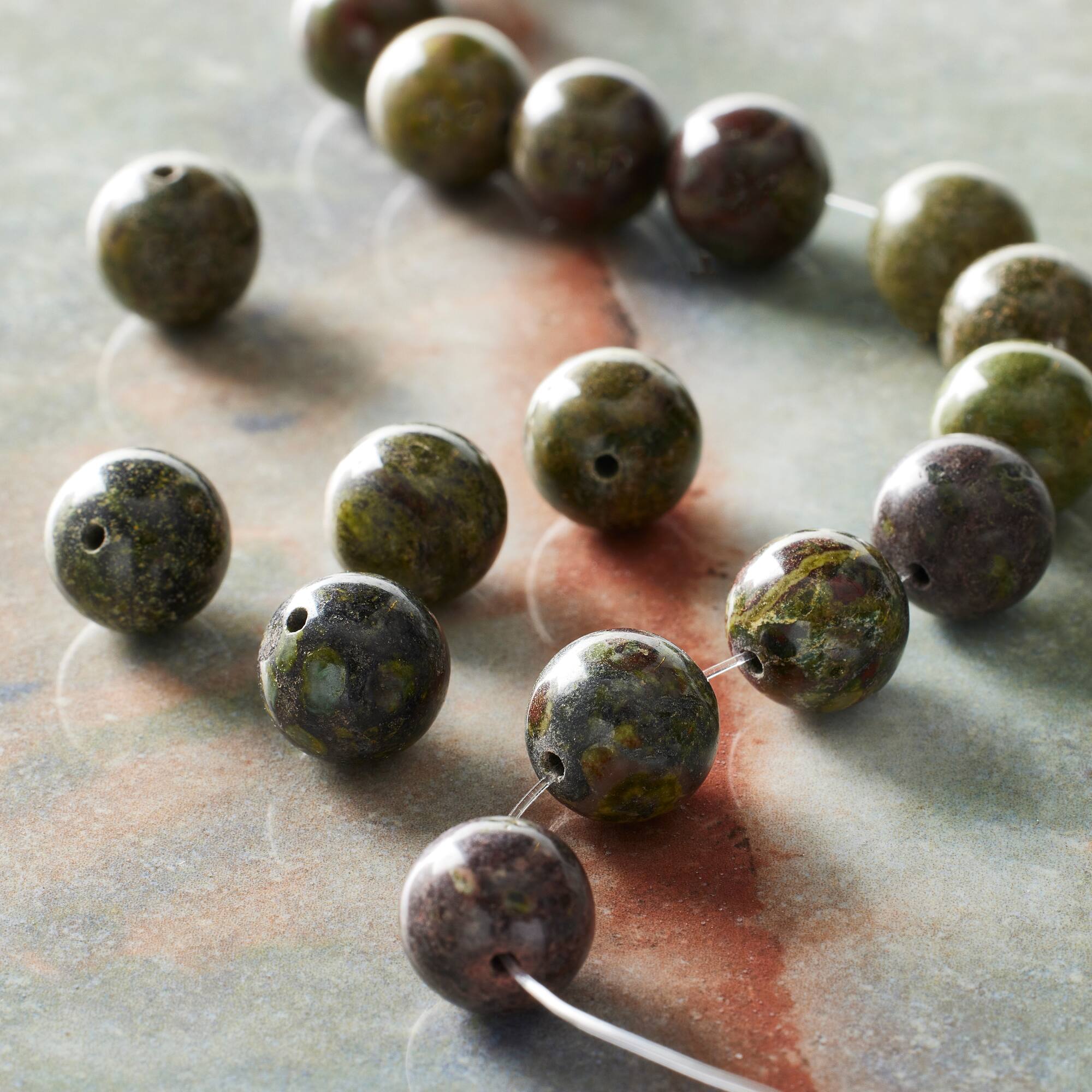 Dragon Blood Round Beads by Bead Landing™, 10mm